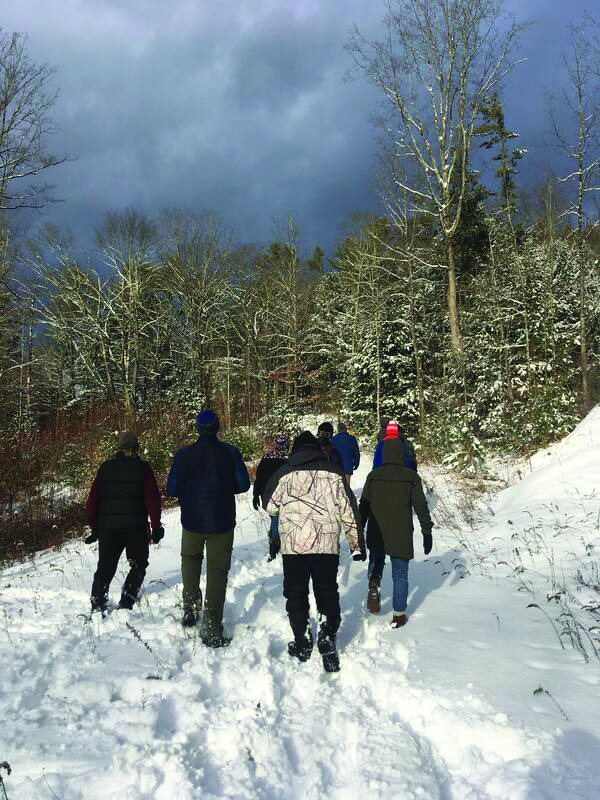 Students in the snow at Glover's Ledge
